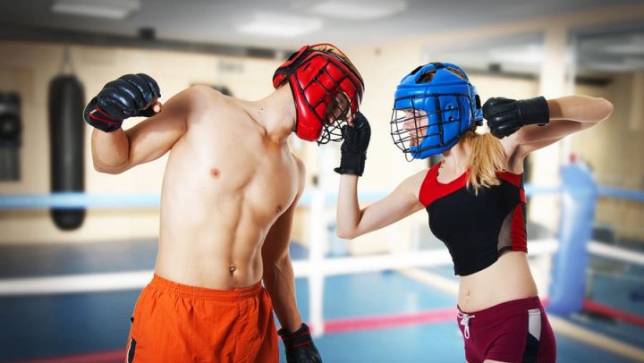 image of a man and a woman in a boxing ring fighting. image illustrates a couple fighting and the importance of fighting properly to save your relationship and if things don't work out to work with ogborne law, phoenix collaborative divorce attorney